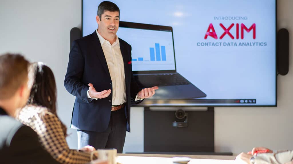 Axim Global leader making a presentation